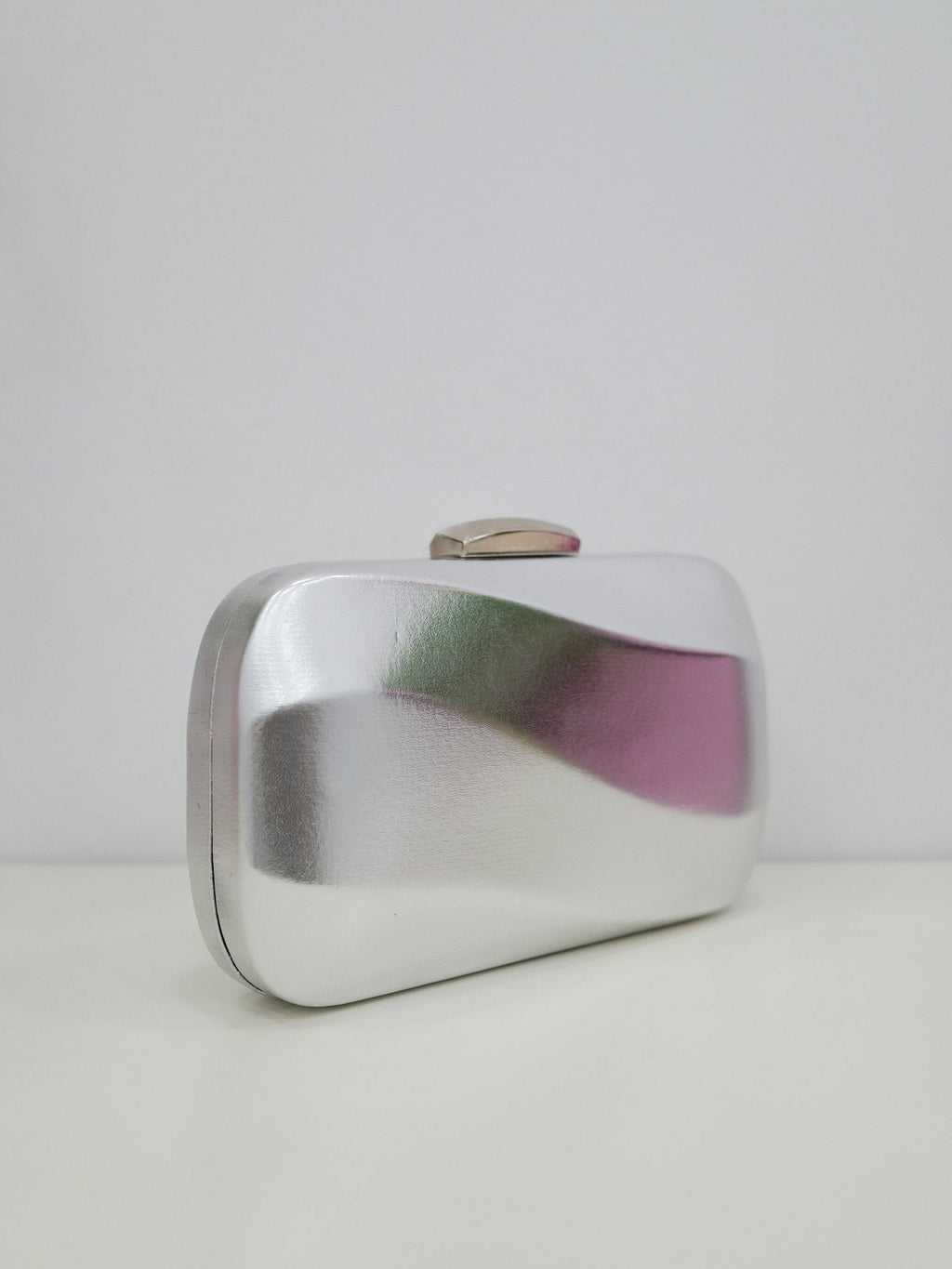 Clutch efecto ola plata