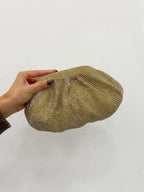 Clutch bombonera brillos dorado